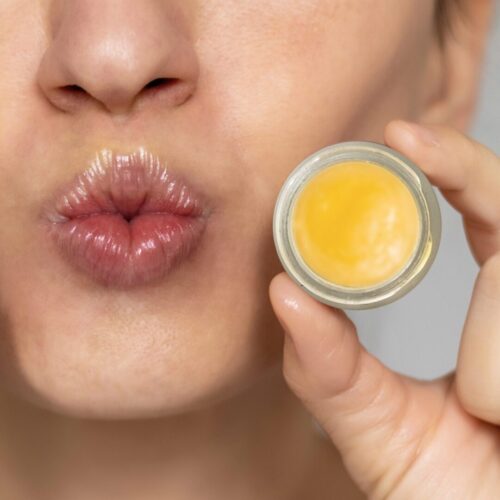 Lip Balm Girl Holding - Orange